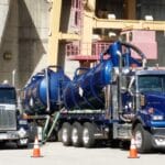 vacuum trucks at dam site 2 tim kovacs scaled