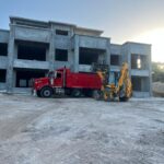 red struck with concrete structure